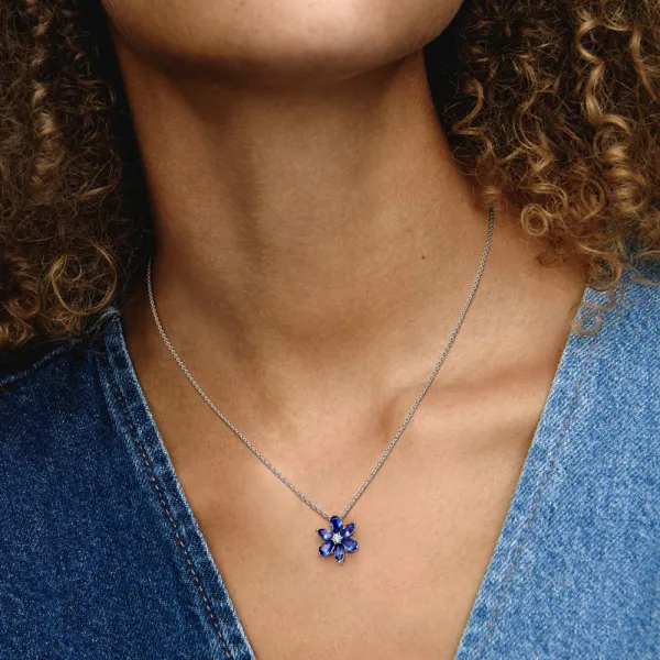 Svetlucava plava ogrlica sa herbarijum klaster priveskom 